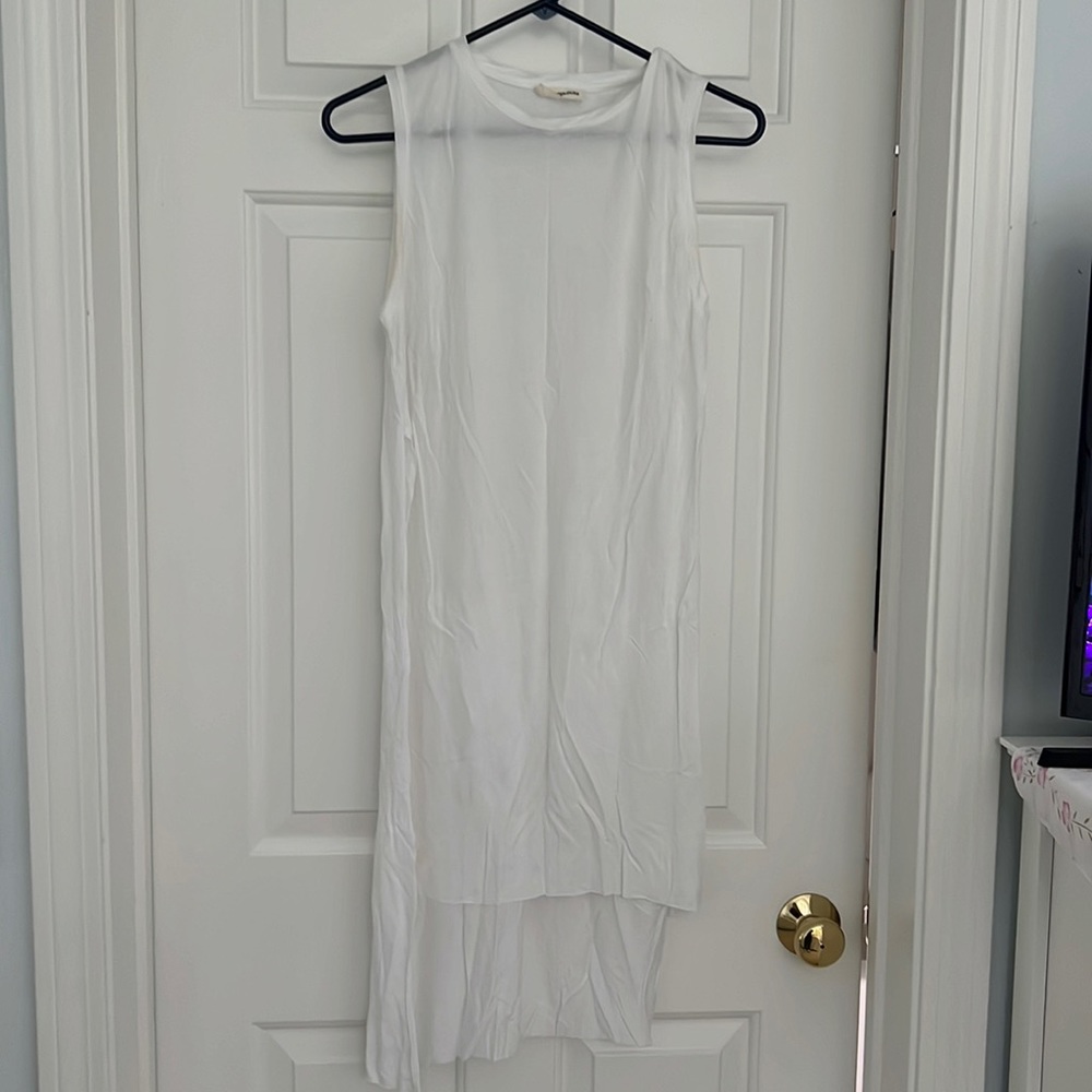 White asymmetrical tank top with high slit